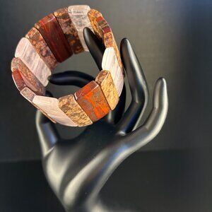 Exotic polished stones and crystals make up this stunning earthy bracelet